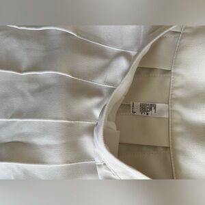 Los Angeles apparel white pleated mini skirt- size L. Fits waist 29-30